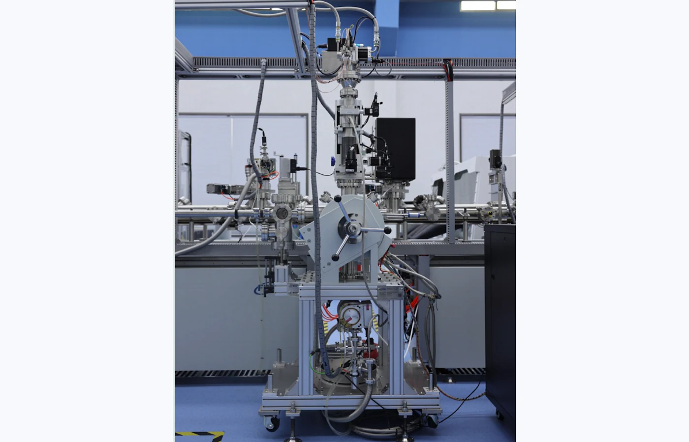 Four-point probe resistivity measurement system